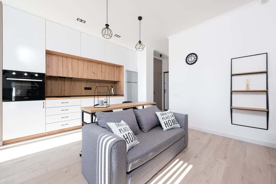 Your Guide to AirBNB Rental Cleaning During the Pandemic Living room inside of an Airbnb that uses The Magic Helpers for professional rental property cleaning services.
